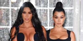 Kim Kardashian and Kourtney Kardashian. James Devaney/Getty Images