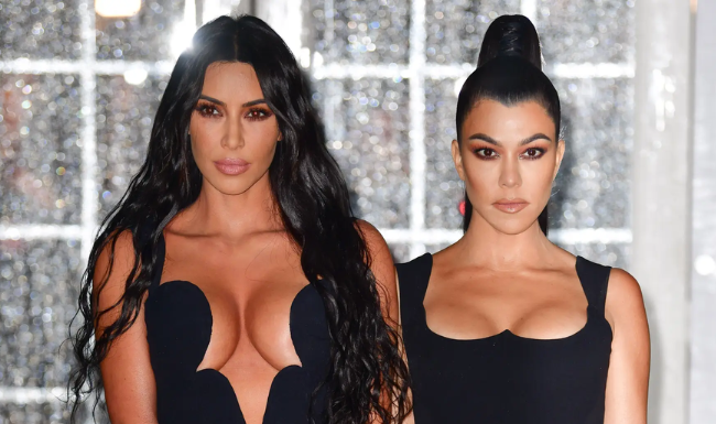 Kim Kardashian and Kourtney Kardashian. James Devaney/Getty Images