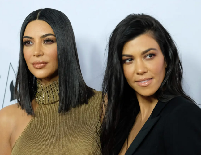 Kim Kardashian and Kourtney Kardashian in Hollywood, on April 12, 2017. CHRIS DELMAS/AFP via Getty Images